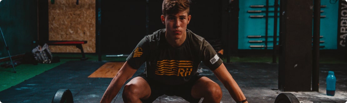 A Person snatching PushPress Gym Management Software